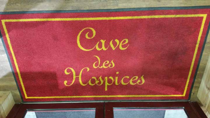 Tapis imprimé du logo de la Boutique